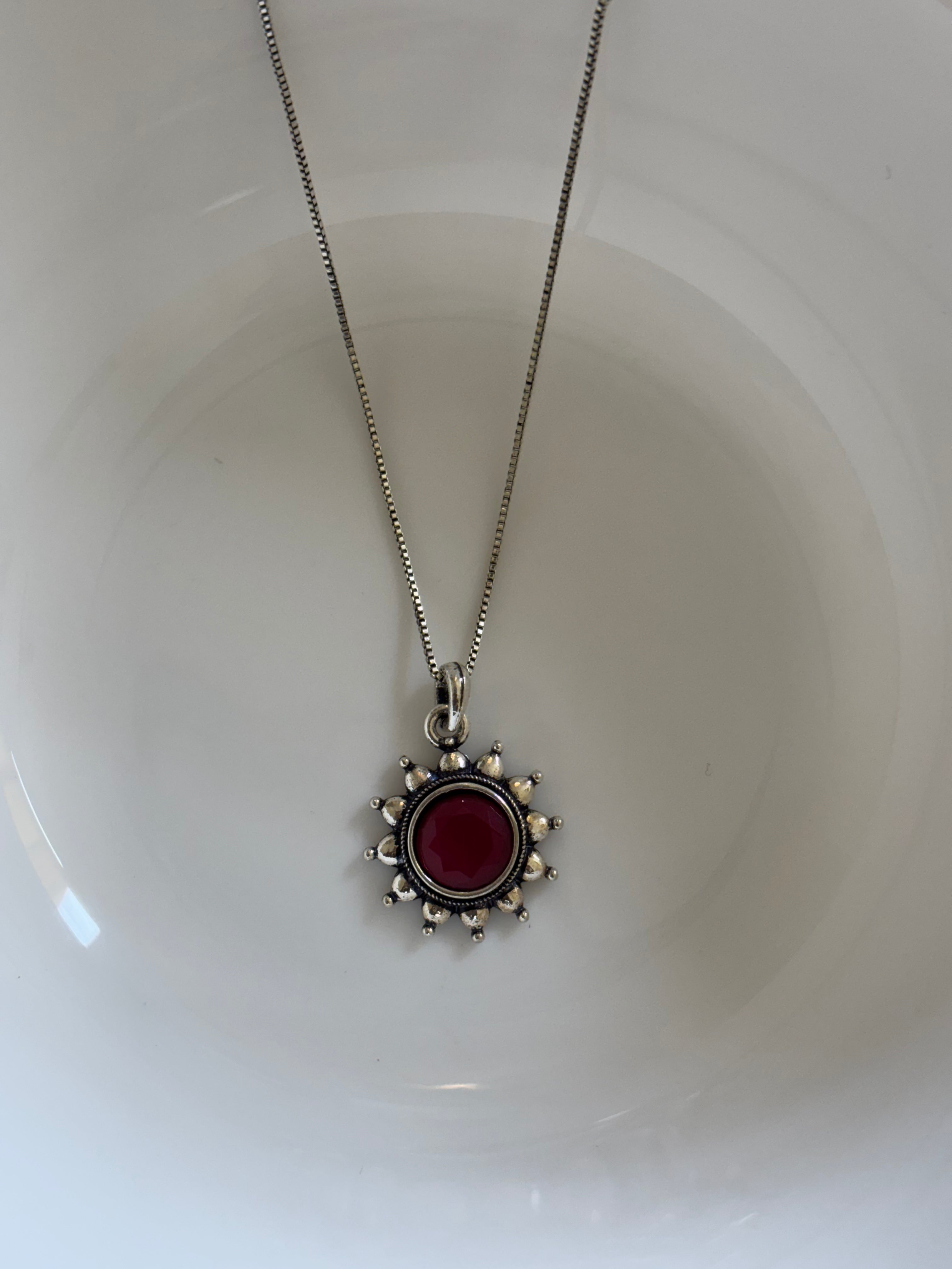 Zave Sterling Silver Sunburst Garnet Necklace