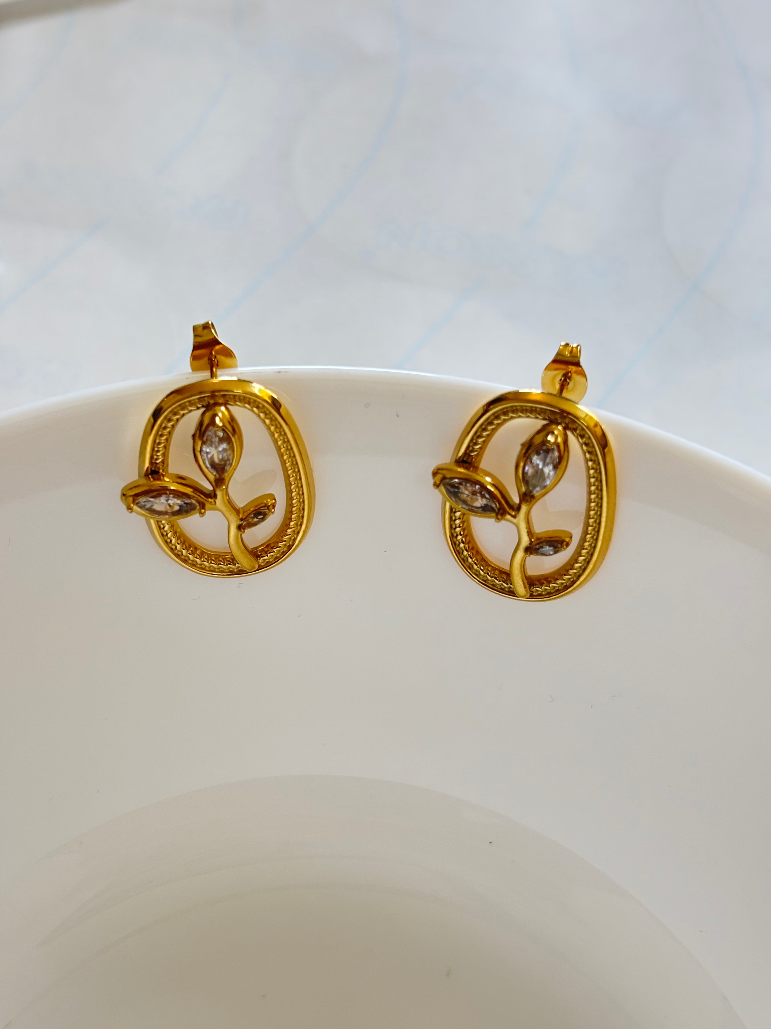 Zave Gold and Crystal Leaf Stud Earrings